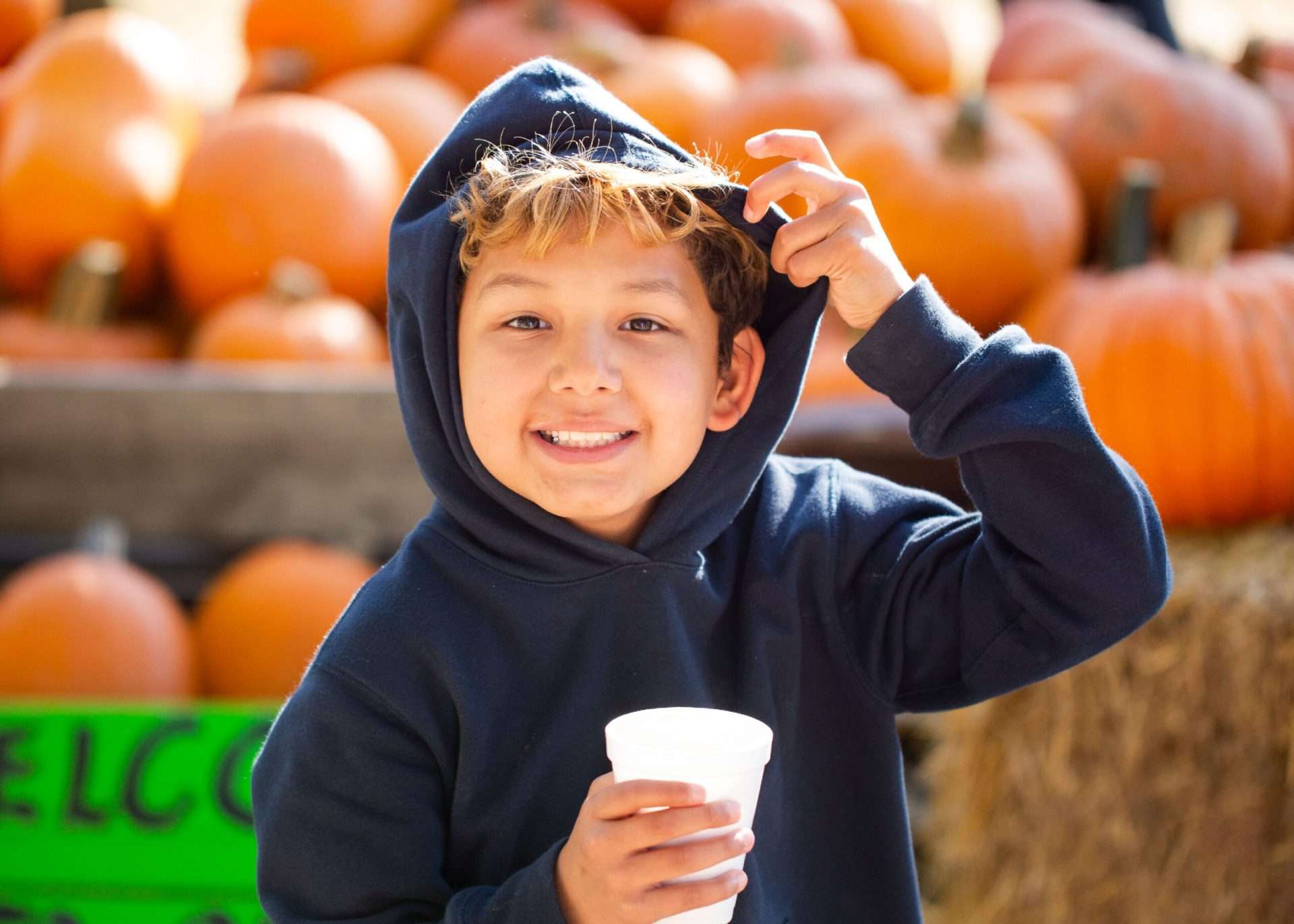 Boy with pumpkins