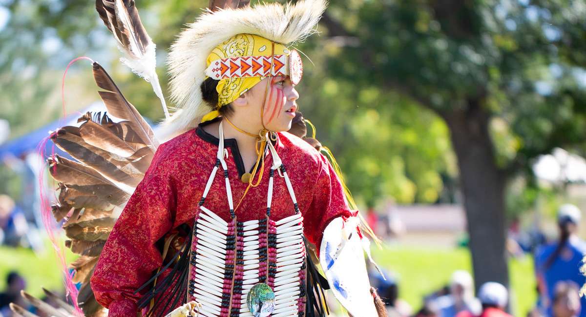 lakota-culture-student Student dressed in traditional powwow attire