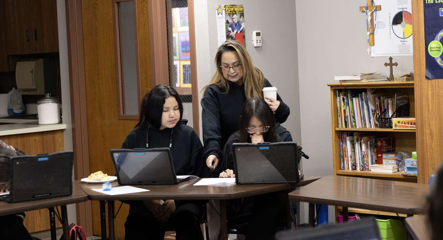 student laptop computer teacher