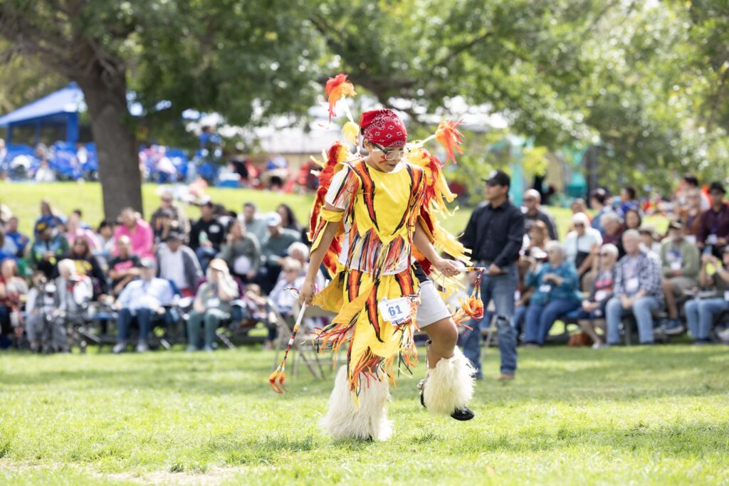 A young student dances during the 49th annual St. Joseph's powwow.